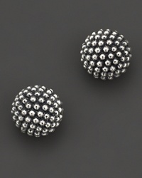 Studded ball earrings with signature Caviar™ beads in sterling silver finished with gold posts. Designed by Lagos. Studded ball earrings with signature Caviar™ beads in sterling silver finished with gold posts. Designed by Lagos.