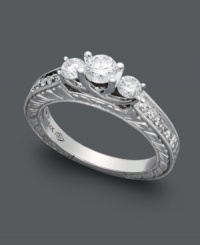 The perfect proposal. This breathtaking diamond ring features a unique, three stone design that shines with the addition of round-cut diamonds (3/4 ct. t.w.) in 14k white gold. The perfect proposal. This breathtaking diamond ring features a unique, three stone design that shines with the addition of round-cut diamonds (3/4 ct. t.w.) in 14k white gold.