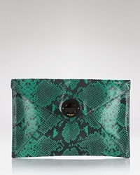 Take kate spade new york out for the night with this snake-embossed leather clutch. Its slim profile is unfailingly understated, while its exotic look makes for a little black dress upping statement. Take kate spade new york out for the night with this snake-embossed leather clutch. Its slim profile is unfailingly understated, while its exotic look makes for a little black dress upping statement.
