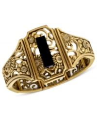 Intricately ornate. T Tahari's stretch bracelet, part of its Deco Lace Collection, is crafted from gold-tone mixed metal with a black stone in the center and glass crystal accents adding luster. Approximate diameter: 2 inches. Intricately ornate. T Tahari's stretch bracelet, part of its Deco Lace Collection, is crafted from gold-tone mixed metal with a black stone in the center and glass crystal accents adding luster. Approximate diameter: 2 inches.