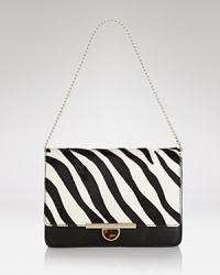 This perennially polished DKNY clutch gets wild in spot-splashed calf hair with luxe leather trim. Let this beauty be the basis of your next fashion moment. This perennially polished DKNY clutch gets wild in spot-splashed calf hair with luxe leather trim. Let this beauty be the basis of your next fashion moment.