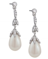 Fit for a princess. Carolee's elegant linear teardrop earrings convey a regal bearing. Adorned with glass pearls and sparkling glass accents, they're crafted in silver tone mixed metal. Approximate drop: 1-1/2 inches. Fit for a princess. Carolee's elegant linear teardrop earrings convey a regal bearing. Adorned with glass pearls and sparkling glass accents, they're crafted in silver tone mixed metal. Approximate drop: 1-1/2 inches.