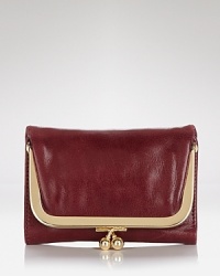 Let Hobo's trifold wallet keep your cash, cards and coins coolly collected. Slip this compact style into your bag for a hit of color during the day. Let Hobo's trifold wallet keep your cash, cards and coins coolly collected. Slip this compact style into your bag for a hit of color during the day.