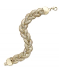 Braided beauty. This gilded Alfani bracelet features a twisted silhouette set in gold tone mixed metal. Approximate length: 8 inches. Braided beauty. This gilded Alfani bracelet features a twisted silhouette set in gold tone mixed metal. Approximate length: 8 inches.