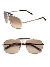 THE LOOKAviator style Metal framesLogo accented temples and end-pieces UVA and UVB protection Signature case includedTHE COLORShiny palladium with brown lensesORIGINMade in Italy THE LOOKAviator style Metal framesLogo accented temples and end-pieces UVA and UVB protection Signature case includedTHE COLORShiny palladium with brown lensesORIGINMade in Italy