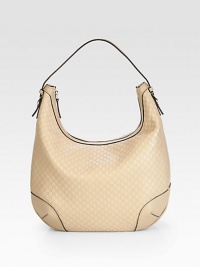 A practical silhouette with an easy carefree feel, this hobo has subtle equestrian inspired detailing and a take-me-anywhere demeanor. Soft microguccissima leatherLeather trimLight gold hardwareTop handle, 4.7 dropSmall spur details with equestrian inspired numbered holesTop zip closureInterior zip and smart phone pocketsNatural cotton linen liningMedium size: 13.4W x 4.3H x 2.4DMade in Italy A practical silhouette with an easy carefree feel, this hobo has subtle equestrian inspired detailing and a take-me-anywhere demeanor. Soft microguccissima leatherLeather trimLight gold hardwareTop handle, 4.7 dropSmall spur details with equestrian inspired numbered holesTop zip closureInterior zip and smart phone pocketsNatural cotton linen liningMedium size: 13.4W x 4.3H x 2.4DMade in Italy
