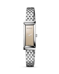 From the G-Frame collection, this sleek watch from Gucci is centered on an elongated rectangle display with minimalist brown mirror dial. From the G-Frame collection, this sleek watch from Gucci is centered on an elongated rectangle display with minimalist brown mirror dial.