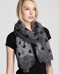 Flowers and dots in shades of gray cover this on-trend MARC BY MARC JACOBS oblong scarf. Flowers and dots in shades of gray cover this on-trend MARC BY MARC JACOBS oblong scarf.