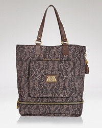 Day or night, get it right with this tote from Juicy Couture. It's all in the roomy silhouette and subtle print, which comes ready for anything in durable nylon. Day or night, get it right with this tote from Juicy Couture. It's all in the roomy silhouette and subtle print, which comes ready for anything in durable nylon.