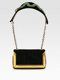 A theatrical style in soft suede with metallic leather trim and an embellished, velvet shoulder detail.Chain and embellished velvet shoulder strap, 10 dropMagnetic snap flap closureThree inner compartmentsSignature red lining7¼W X 4H X 2DMade in Italy A theatrical style in soft suede with metallic leather trim and an embellished, velvet shoulder detail.Chain and embellished velvet shoulder strap, 10 dropMagnetic snap flap closureThree inner compartmentsSignature red lining7¼W X 4H X 2DMade in Italy