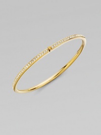 EXCLUSIVELY AT SAKS. A row of shimmering channel-set crystals within a glowing, golden hinged bangle. Crystal 18k goldplated Diameter, about 2¼ Push-lock clasp Imported EXCLUSIVELY AT SAKS. A row of shimmering channel-set crystals within a glowing, golden hinged bangle. Crystal 18k goldplated Diameter, about 2¼ Push-lock clasp Imported