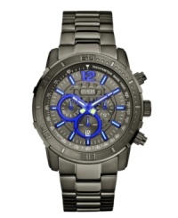 Bright blue electrifies this monochromatic chronograph watch by GUESS. Bright blue electrifies this monochromatic chronograph watch by GUESS.
