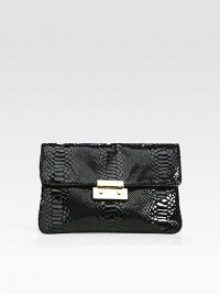 Slick patent leather flaunts an exquisite python print for a sleek, statement making design. Removable chain strap; 11 drop Flap closure with magnetic clasp One inside zip pocket Two inside open pockets Inside credit card slots Cotton lined 11W X 7H X ½W Patent leather Imported Slick patent leather flaunts an exquisite python print for a sleek, statement making design. Removable chain strap; 11 drop Flap closure with magnetic clasp One inside zip pocket Two inside open pockets Inside credit card slots Cotton lined 11W X 7H X ½W Patent leather Imported
