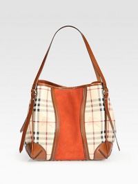 A colorblocked design with a chic blend of leather, suede and iconic check printed, coated canvas.Double leather shoulder straps, 8½ dropSnap button closureOne inside zip pocketTwo inside open pocketsCotton lining10W X 11½H X 6DMade in Italy A colorblocked design with a chic blend of leather, suede and iconic check printed, coated canvas.Double leather shoulder straps, 8½ dropSnap button closureOne inside zip pocketTwo inside open pocketsCotton lining10W X 11½H X 6DMade in Italy