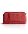 Think rich: soft, waxy pebbled leather gets contrast stitching and a goldtone cutout logo detail with the sleek Banker wallet from Giani Bernini.