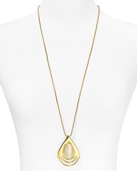 Dramatic pendants are a must-have this season. Make the look yours with this shapely 14-karat style from Belle Noel, featuring a striking teardrop design with inset white cat's eye. Dramatic pendants are a must-have this season. Make the look yours with this shapely 14-karat style from Belle Noel, featuring a striking teardrop design with inset white cat's eye.