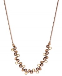 Simply stunning. This frontal strand necklace from Givenchy is crafted from brown gold-tone mixed metal with glass and cubic zirconia accents for a bold fashion statement. Approximate length: 16 inches + 2-inch extender. Simply stunning. This frontal strand necklace from Givenchy is crafted from brown gold-tone mixed metal with glass and cubic zirconia accents for a bold fashion statement. Approximate length: 16 inches + 2-inch extender.