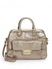 THE LOOKDouble top handlesRemovable, adjustable leather crossbody strapTop zip closureOne outside magnetic tab-and-loop flap pocketFront logo buckleProtective metal feetTwo inside open pocketsOne inside zip pocketInside logo detailTHE MEASUREMENTCrossbody strap, 15-20 drop12½W X 9H X 5DTHE MATERIALMetallic leatherFully linedORIGINImported THE LOOKDouble top handlesRemovable, adjustable leather crossbody strapTop zip closureOne outside magnetic tab-and-loop flap pocketFront logo buckleProtective metal feetTwo inside open pocketsOne inside zip pocketInside logo detailTHE MEASUREMENTCrossbody strap, 15-20 drop12½W X 9H X 5DTHE MATERIALMetallic leatherFully linedORIGINImported
