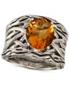 Bohemian bliss. EFFY Collection's chic cocktail ring features an oxidized sterling silver band with an intricate woven pattern and an oval-cut citrine (4-1/10 ct. t.w.) center stone. Approximate width: 9/10 inch. Size 7.