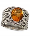 Bohemian bliss. EFFY Collection's chic cocktail ring features an oxidized sterling silver band with an intricate woven pattern and an oval-cut citrine (4-1/10 ct. t.w.) center stone. Approximate width: 9/10 inch. Size 7.