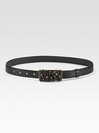 Rich saffiano textured calfskin embellished with a resin stone buckle detail. About 1 wide Made in Italy Rich saffiano textured calfskin embellished with a resin stone buckle detail. About 1 wide Made in Italy