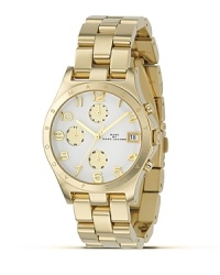 MARC BY MARC JACOBS has timed it right with the Henry chronograph. Round white dial with three-eye function and signature logo-enhanced bezel. Goldplated bracelet strap. MARC BY MARC JACOBS has timed it right with the Henry chronograph. Round white dial with three-eye function and signature logo-enhanced bezel. Goldplated bracelet strap.