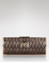 Rich snake-embossed leather lends natural elegance to this Tory Burch clutch, styled in a palm-perfect shape. Rich snake-embossed leather lends natural elegance to this Tory Burch clutch, styled in a palm-perfect shape.