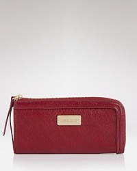 Go back to basics with this essential style from See by Chloé, featuring a rich leathery look and multiple interior pockets. It's the wallet we want now. Go back to basics with this essential style from See by Chloé, featuring a rich leathery look and multiple interior pockets. It's the wallet we want now.