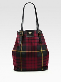 A leather accented style in classic canvas tartan with an iconic razor detail.Double adjustable leather top handles, 1-13 dropOpen topOne inside zip pocketTwo inside open pocketsCotton lining12½W X 15H X 5½DMade in Italy A leather accented style in classic canvas tartan with an iconic razor detail.Double adjustable leather top handles, 1-13 dropOpen topOne inside zip pocketTwo inside open pocketsCotton lining12½W X 15H X 5½DMade in Italy