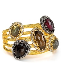 Adorned with bold gemstones and light-catching crystals, this Alexis Bittar bangle is oh so ready to show off, cast in gold plated metal. Adorned with bold gemstones and light-catching crystals, this Alexis Bittar bangle is oh so ready to show off, cast in gold plated metal.