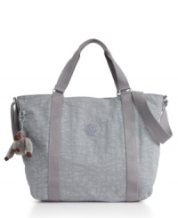 Kipling's latest and generously sized tote goes anywhere and everywhere...to work, the gym, shopping and overnights, too! Kipling's latest and generously sized tote goes anywhere and everywhere...to work, the gym, shopping and overnights, too!