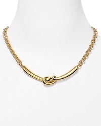 A classic knot detail defines this gold plated Robert Lee Morris Soho necklace, juxtaposing a traditional motif with a modern silhouette. A classic knot detail defines this gold plated Robert Lee Morris Soho necklace, juxtaposing a traditional motif with a modern silhouette.