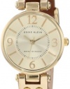 Anne Klein Women's 109442CHHY Gold-Tone Champagne Dial and Brown Leather Strap Watch