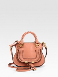 Iconic leather-wrapped top handles and topstitch detailing define this casual classic.Tennis-wrapped double top handles, 4Removable crossbody strap, 20 dropTop zip closureOne inside open pocketCotton lining7W X 5H X 3DMade in Italy Iconic leather-wrapped top handles and topstitch detailing define this casual classic.Tennis-wrapped double top handles, 4Removable crossbody strap, 20 dropTop zip closureOne inside open pocketCotton lining7W X 5H X 3DMade in Italy