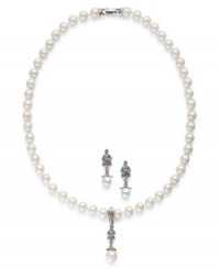 Enduring elegance, by Charter Club. This pretty jewelry set displays classic style with a glass pearl strand necklace and drop earrings. Crafted in imitation rhodium-plated mixed metal. Approximate length (necklace): 18 inches + 1-1/2-inch extender. Approximate drop (earrings): 1/4 inches. Enduring elegance, by Charter Club. This pretty jewelry set displays classic style with a glass pearl strand necklace and drop earrings. Crafted in imitation rhodium-plated mixed metal. Approximate length (necklace): 18 inches + 1-1/2-inch extender. Approximate drop (earrings): 1/4 inches.