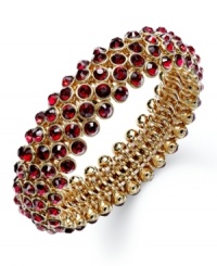 Slip on some alluring tones that add beauty to any look. Charter Club's chic bubble beaded style features siam glass accents in gold tone mixed metal. Bracelet stretches to fit wrist. Approximate diameter: 2-1/4 inches. Slip on some alluring tones that add beauty to any look. Charter Club's chic bubble beaded style features siam glass accents in gold tone mixed metal. Bracelet stretches to fit wrist. Approximate diameter: 2-1/4 inches.