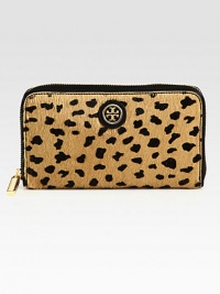 A luxurious animal printed haircalf style accented with leather trim and logo emblem.Zip-around closureOne inside zip pocketEight credit card slotsTwo bill compartmentsLeather lining7½W X 4½H X 1DImported A luxurious animal printed haircalf style accented with leather trim and logo emblem.Zip-around closureOne inside zip pocketEight credit card slotsTwo bill compartmentsLeather lining7½W X 4½H X 1DImported