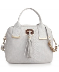 A luxe leather look from Elliott Lucca. Polished goldtone hardware and classic tassels detail this sassy yet sophisticated style for a look you'll want to show off day and night. A luxe leather look from Elliott Lucca. Polished goldtone hardware and classic tassels detail this sassy yet sophisticated style for a look you'll want to show off day and night.