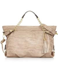 What's not to love about lizard print? Sleek, sophisticated and with a little attitude, this classic carryall from Steve Madden features polished gold-tone hardware, chain-link handles and contemporary crossbody strap. Its spacious interior includes pockets for wallet, phone, keys and anything else you need to carry with care. What's not to love about lizard print? Sleek, sophisticated and with a little attitude, this classic carryall from Steve Madden features polished gold-tone hardware, chain-link handles and contemporary crossbody strap. Its spacious interior includes pockets for wallet, phone, keys and anything else you need to carry with care.