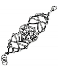 Elegantly intricate, this cuff bracelet from GUESS is crafted from hematite-tone mixed metal with a filigree pattern and glass crystal stones enhancing its appeal. Approximate diameter: 2-1/2 inches. Elegantly intricate, this cuff bracelet from GUESS is crafted from hematite-tone mixed metal with a filigree pattern and glass crystal stones enhancing its appeal. Approximate diameter: 2-1/2 inches.