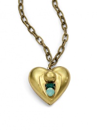 THE LOOKPendant silhouetteHeart pendantGreen Swarovski crystal accentsBrass-plated settingTHE MEASUREMENTPendant width, about 1.5Pendant length, about 1.75Length, about 30ORIGINMade in USA THE LOOKPendant silhouetteHeart pendantGreen Swarovski crystal accentsBrass-plated settingTHE MEASUREMENTPendant width, about 1.5Pendant length, about 1.75Length, about 30ORIGINMade in USA