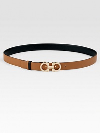 Sumptuous Italian leather belt that reverses from brown to black with goldtone double Gancini buckle.Width, about 1Made in Italy Sumptuous Italian leather belt that reverses from brown to black with goldtone double Gancini buckle.Width, about 1Made in Italy