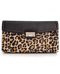 After-hours attire deserves exquisite style, like this party-perfect clutch from Cole Haan. Crafted in ultra-soft leather with haircalf detailing, the surprisingly spacious interior holds cards, cash, phone and other mini must-haves. After-hours attire deserves exquisite style, like this party-perfect clutch from Cole Haan. Crafted in ultra-soft leather with haircalf detailing, the surprisingly spacious interior holds cards, cash, phone and other mini must-haves.