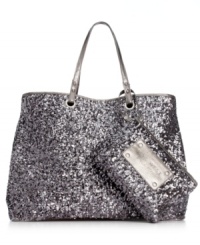A classic silhouette gets a glam update in shimmery sequin that's absolutely eye-catching. The spacious interior features plenty of pockets to ensure all your belongings stay safe, while the complementary wristlet keeps ID, cash and cards close at hand. A classic silhouette gets a glam update in shimmery sequin that's absolutely eye-catching. The spacious interior features plenty of pockets to ensure all your belongings stay safe, while the complementary wristlet keeps ID, cash and cards close at hand.