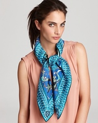 Channel a retro vibe with this brightly colored, vintage-inspired silk scarf from Emilio Pucci. Channel a retro vibe with this brightly colored, vintage-inspired silk scarf from Emilio Pucci.
