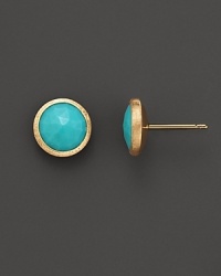 Faceted turquoise is accented with brushed 18K yellow gold in these statement stud earrings from Marco Bicego. Faceted turquoise is accented with brushed 18K yellow gold in these statement stud earrings from Marco Bicego.
