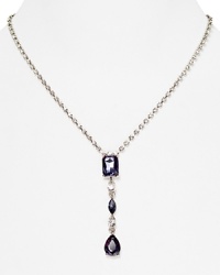 A delicate stone and crystal pendant is a glamorous focal point on this Carolee necklace, crafted of silver plated metal. A delicate stone and crystal pendant is a glamorous focal point on this Carolee necklace, crafted of silver plated metal.