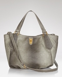 This MARC BY MARC JACOBS tote everyday-perfect. Its snap closure keeps the essentials secure, while its exotically embossed PVC exterior plays as hard as it works. This MARC BY MARC JACOBS tote everyday-perfect. Its snap closure keeps the essentials secure, while its exotically embossed PVC exterior plays as hard as it works.