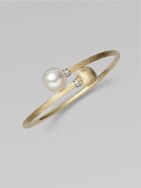 Brushed 18k yellow gold, luminous diamonds, and an iridescent pearl richly combine to create this artistic, elegant design.Diamonds, 0.06 tcw Freshwater pearl 18k yellow gold Diameter, about 2½ Made in Italy Brushed 18k yellow gold, luminous diamonds, and an iridescent pearl richly combine to create this artistic, elegant design.Diamonds, 0.06 tcw Freshwater pearl 18k yellow gold Diameter, about 2½ Made in Italy