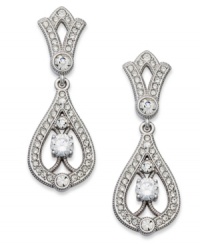Endless glamour from Eliot Danori. These dazzling Splendor earrings reflect elegance with crystal accents and cubic zirconias (1/2 ct. t.w.). Set in rhodium-plated mixed metal. Approximate drop: 1-1/4 inches. Endless glamour from Eliot Danori. These dazzling Splendor earrings reflect elegance with crystal accents and cubic zirconias (1/2 ct. t.w.). Set in rhodium-plated mixed metal. Approximate drop: 1-1/4 inches.